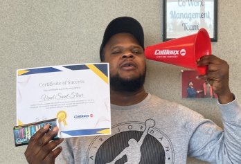 CoWorx workers holding certificate of success